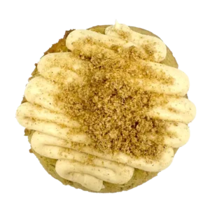 Gourmet Banana Bread Cookie topped with cinnamon cream cheese frosting and cinnamon streusel, a soft and chewy cookie infused with banana reduction and baked to perfection for The Colorado Cookie Company’s November featured flavor.