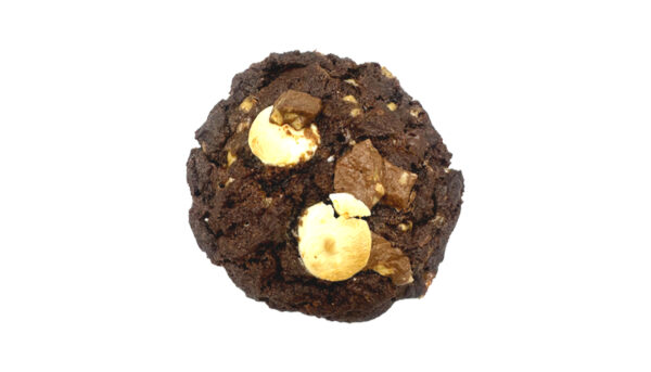 A giant chocolate cookie full of buttery toffee and chocolate chips and topped with chopped heath bars and white chocolate