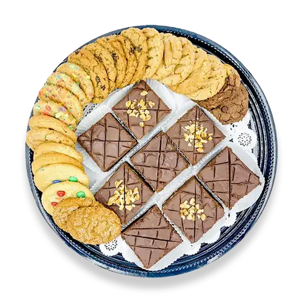 Assorted classic cookies and brownies on a round catering tray.