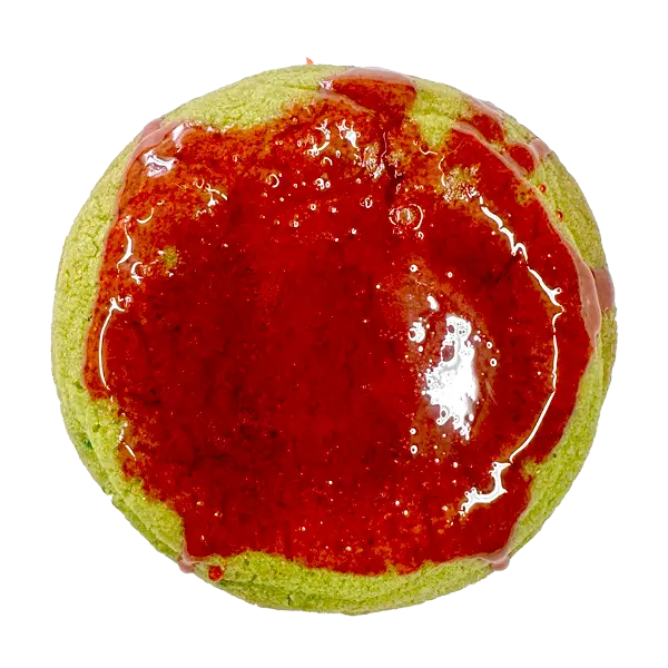 A sour apple cookie dough, stuffed with apple pie filling and dipped in a chewy, crunchy candy apple topping.