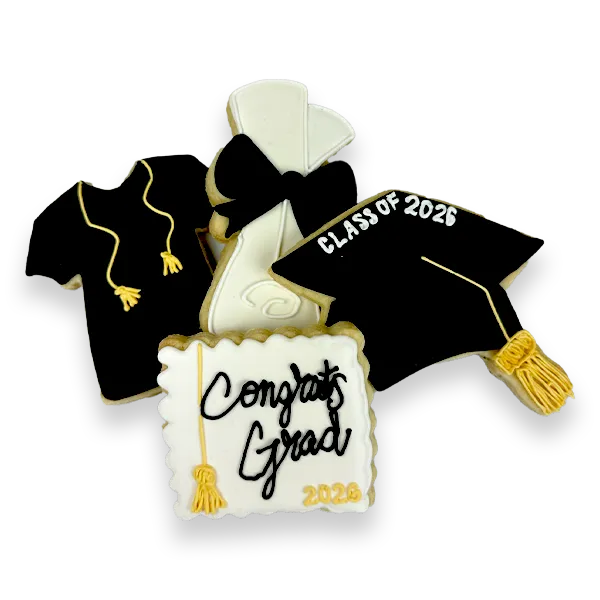Decorated graduation sugar cookies in black, white, and gold royal icing, including a graduation cap, diploma, gown, and “Congrats Grad” plaque cookie.