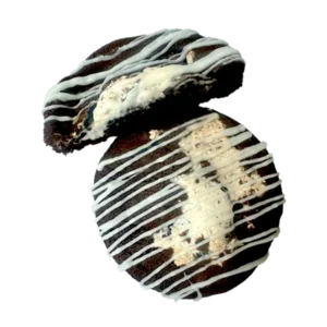 Chocolate cookie dough stuffed with a full Oreo and marshmallow fluff, then topped with a drizzle of white chocolate