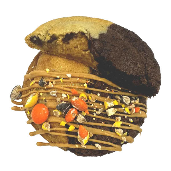 Chocolate brownie and Chocolate Chip come together after being stuffed with homemade peanut butter cookie butter, then finished off with peanut butter and Reece’s Pieces.