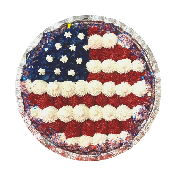 7-inch deep dish chocolate chip cookie cake, baked fresh and hand-decorated with smooth buttercream in a festive red, white, and blue flag design.